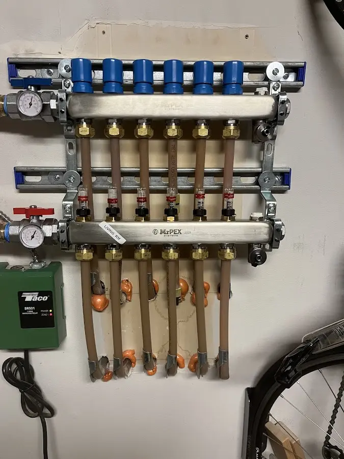 Plumber performing Leak Detection at a residential property in Rensselaer